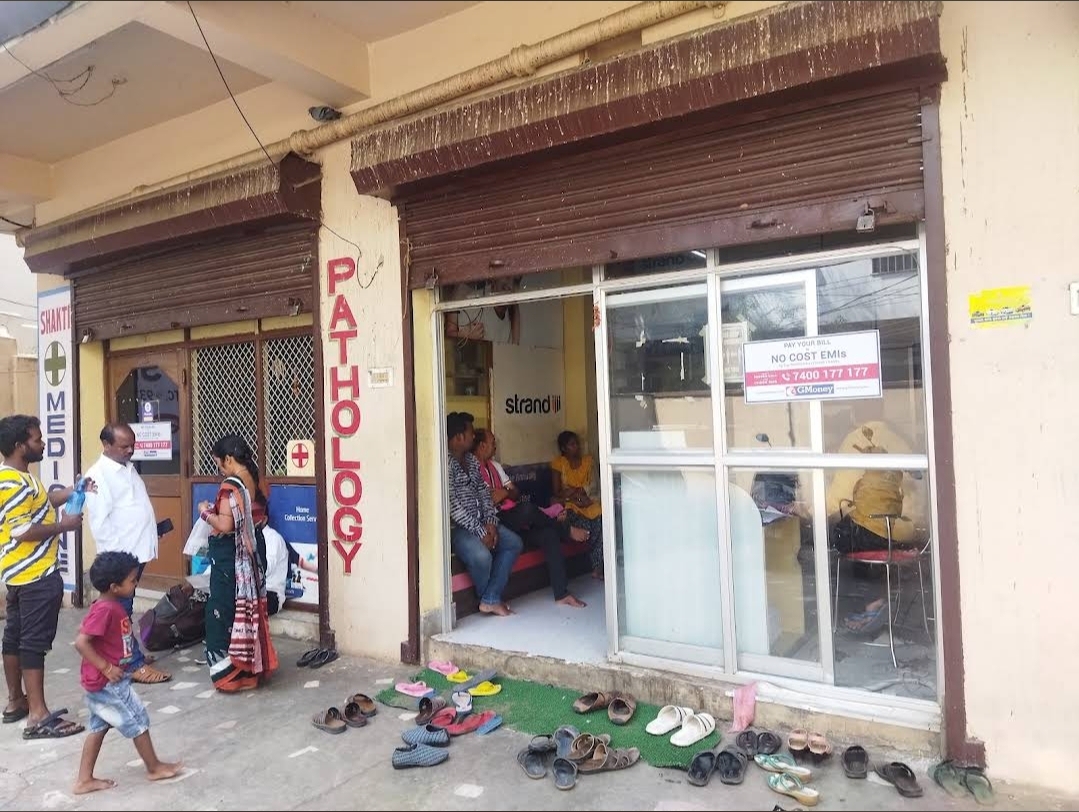 Clinic entrance with patients waiting